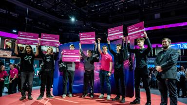 TalTechi AI-võistluse 2025 kuus võitjat koos diploomidega laval Robotexil - Giorgio Lelmi, Sámuel Virág, Mikk Merzin, Patrik Raudsepp, Kadir Ristjan Klade ja Jaanek Sildam