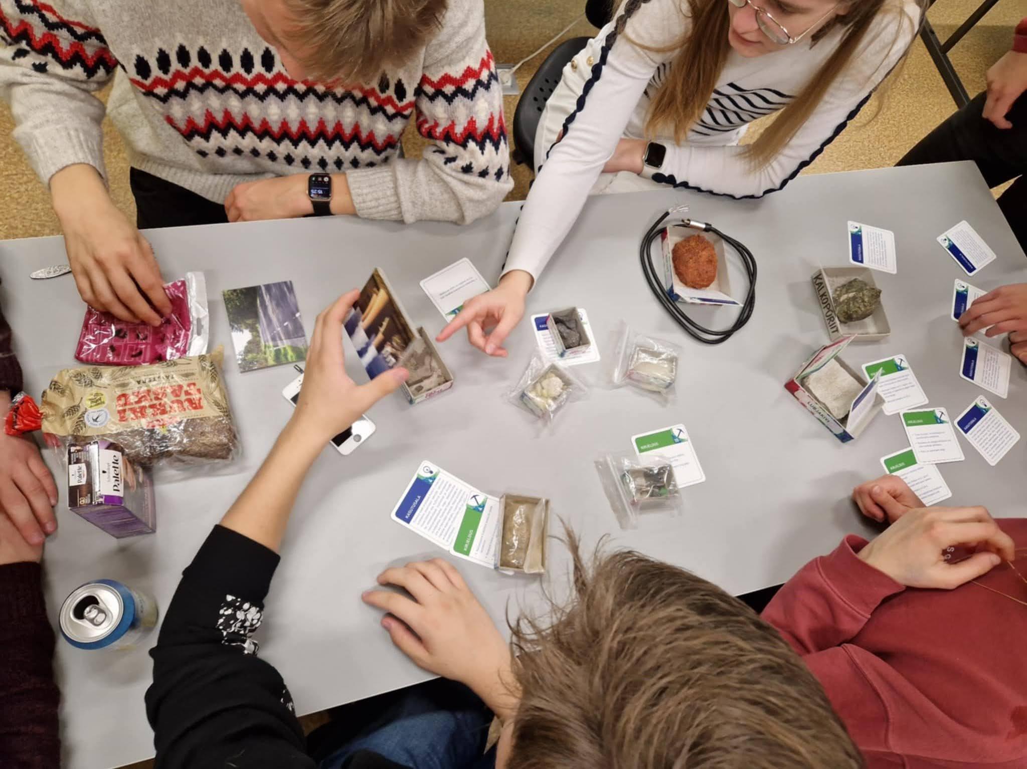 people playing a card game