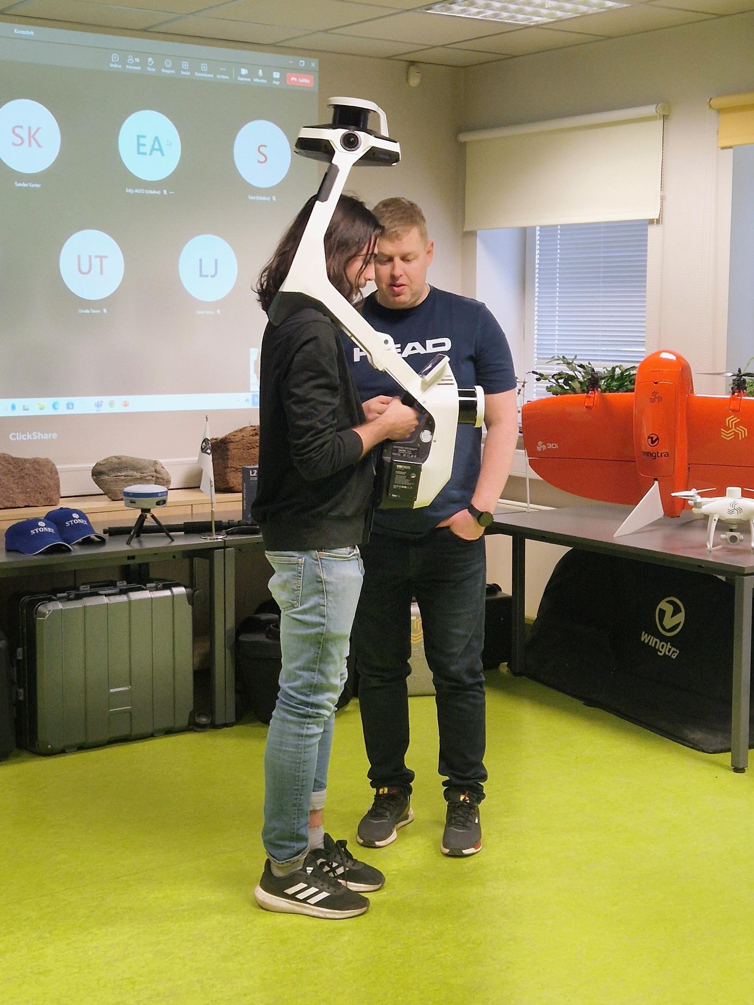 two men testing equipment